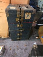 Closed trunk front showing latches, hardware, exterior color and stripe