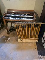 Full view of console organ and detached pedalboard