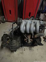 Engine and manual transaxle side view showing intake manifold and gearbox housing