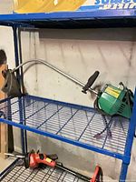 Full view of Weed Eater XCR-80 trimmer on shelf showing curved shaft and guard