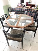 Full set showing octagonal table and four chairs