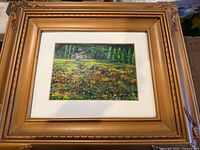 Front view of framed oil painting showing entire frame and mat
