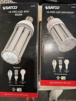 Front of two boxed Satco Hi-Pro LED 45W 5000K bulbs