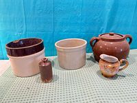 Group shot of all five ceramic pieces on table