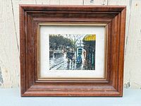 Front view showing framed painting with mat and wood frame