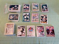 Overview of all card stacks and sleeved singles on table