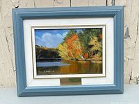 Front view of framed oil painting