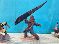 Chewbacca figure holding shield