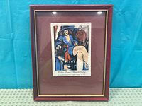 Front view of framed gallery ticket showing artwork, mat and frame