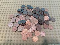 Pile of Canadian 5-cent George VI coins