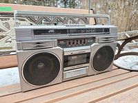 Front view of JVC RC-680 boombox showing speakers, cassette deck, equalizer sliders
