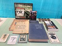 overview of books, newspapers, DVD, photos and epaulettes