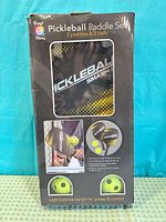 Front of boxed Trend Vision Pickleball Paddle Set packaging
