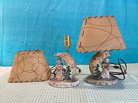 Pair of lamps with shades shown together