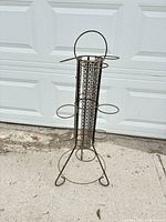 Full view of metal wire plant stand front
