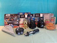 Front view of all seven Micro Machines transforming action sets with packaging backers