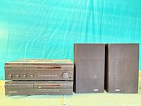 Front view of receiver, CD player, and pair of speakers