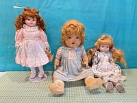 Front view of all three dolls