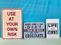 All three signs front view