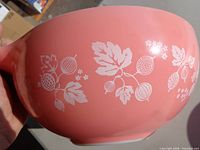 Side view showing pink color and white gooseberry pattern