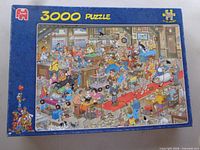 Front view of Jumbo 3000-piece puzzle box showing Jan van Haasteren artwork