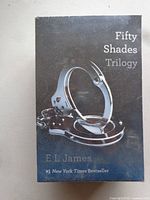 Front view of sealed Fifty Shades Trilogy box set