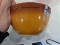 Side view showing brown to yellow ombre exterior of bowl