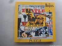 Front view of boxed Beatles Anthology 500-piece puzzle showing artwork and series information