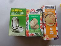 Three Bernardin Snap Lid boxes showing wide-mouth, regular and GEM varieties
