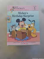 Front cover Volume 1 Mickey's Birthday Surprise showing series branding and condition