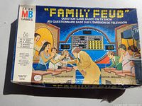 Colour-illustrated lid showing Family Feud TV show artwork and MB Games branding