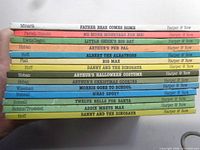 Spine view of all 14 Harper & Row I Can Read Books stacked