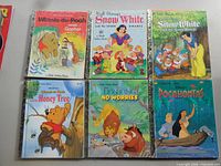 Six Disney Little Golden Books including two Pooh, two Snow White, Lion King No Worries, Pocahontas