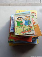 Stack of Richard Scarry books showing variety of titles and sizes