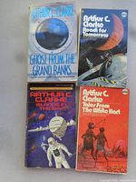 Front covers of all four Arthur C. Clarke paperbacks