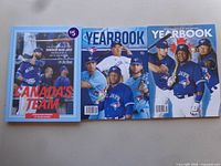 Front covers of all three Toronto Blue Jays yearbook magazines