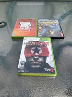 Front view of the three game cases