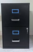 Front view of black 2-drawer filing cabinet
