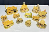 Group view of twelve David Winter cottage figurines