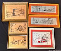 Group shot of all six framed etched artworks