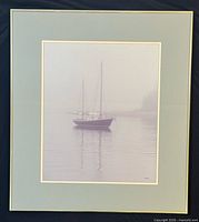Full view of framed print showing sailboat scene, frame, matting