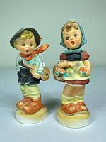 Front view of both figurines