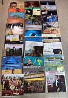 All records laid out in three stacks showing fronts of jackets