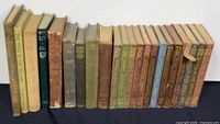 Entire row of approximately 22 vintage hardcovers