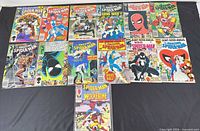 Overview of all 13 Spider-Man comics laid out