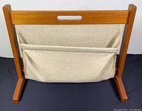 Front view showing wood frame and fabric sling