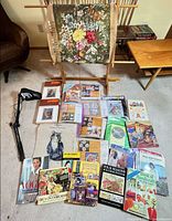 Overview of frame, canvas, lamp, books and kits