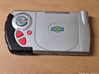 Front view of closed D-Terminal showing Digimon logo and controls