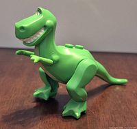 Left-front angled view of Rex figure showing overall shape and color