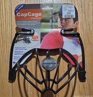 Front view of Perfect Curve CapCage on retail card